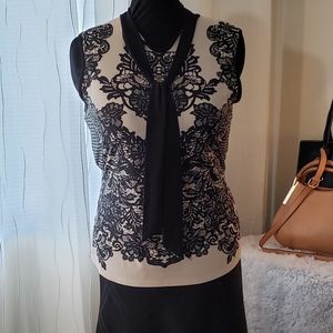 Sleeveless dress shirt.